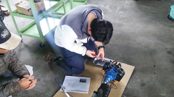 写真① 刈払機メンテナンス.jpg
